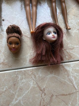 Muñecas y cabezas de muñeca y cuerpo