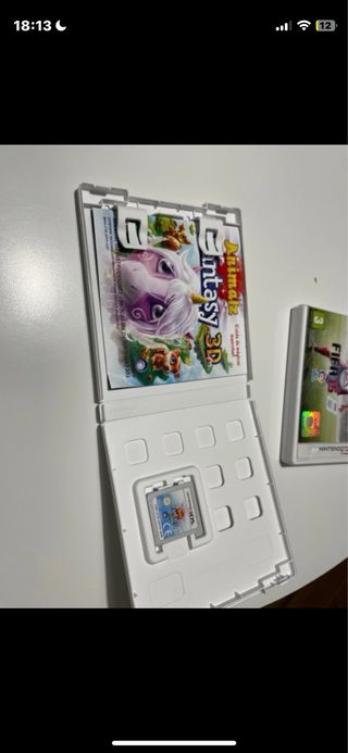 Nintendo 2DS Rosa con funda y juegos