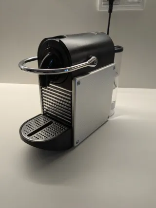 Cafetera Nespresso DeLonghi con cápsulas