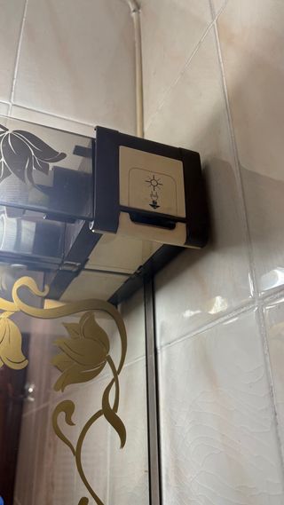 Espejo de baño vintage con detalles dorados