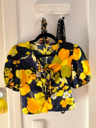 Conjunto hippie floral negro y naranja