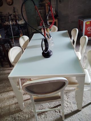 Mesa rectangular con 6 sillas tapizadas