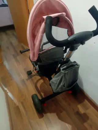 Triciclo rosa poco uso