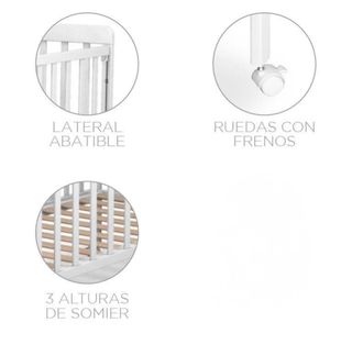 Cuna blanca con barrotes de madera