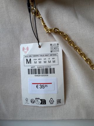 Clutch lentejuelas doradas Zara