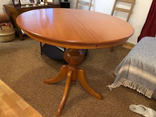 Mesa de comedor redonda de madera