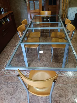 Mesa de cristal extensible y 6 sillas