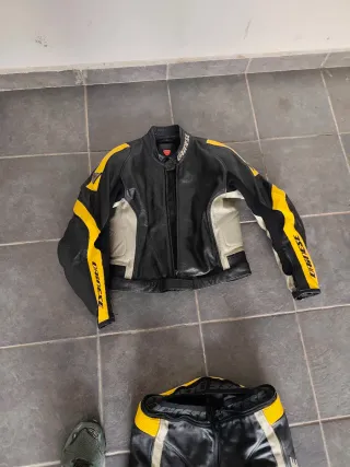 Mono Dainese 2 piezas negro y amarillo