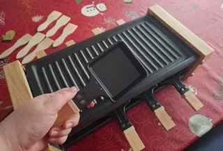 Plancha de piedra y madera