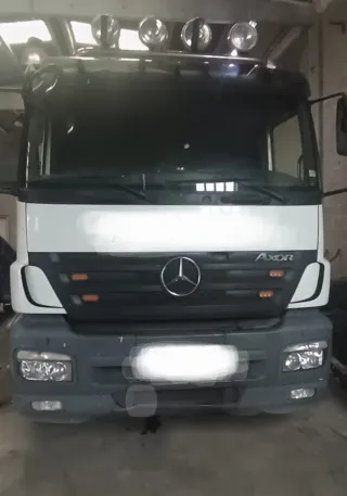 Iveco eurocargo volquete y grúa  2011