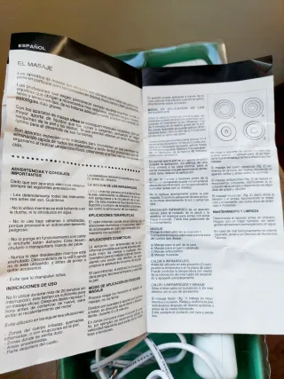 Masajeador Ufesa con accesorios