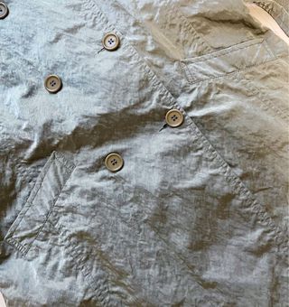 Gabardina ligera verde iridiscente Peter Murray