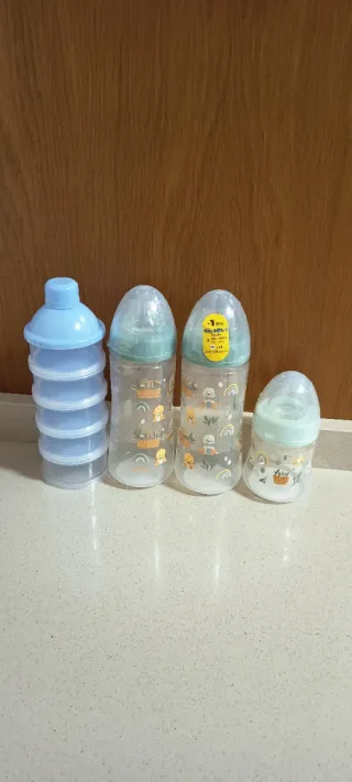 Biberón y dosificador leche