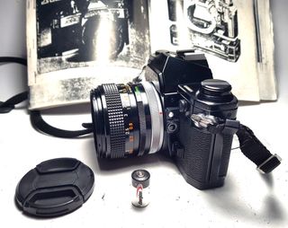 Canon AE-1 Negra con Lente FD 50mm f/1.4