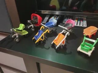 Lote Playmobil: carritos, motos y más