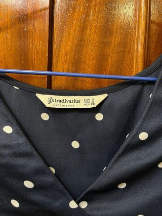 Blusa de lunares negra y blanca