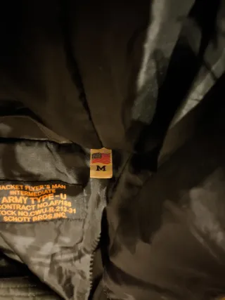 Abrigo Schott verde militar impermeable