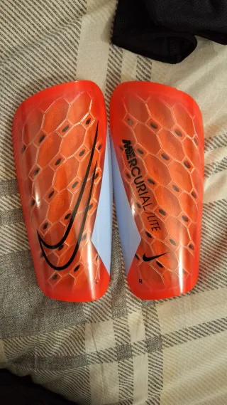 Espinilleras Fútbol Nike Mercurial Lite Naranja