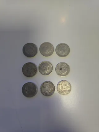 Lote 25 monedas 10, 5 pst y J.C.