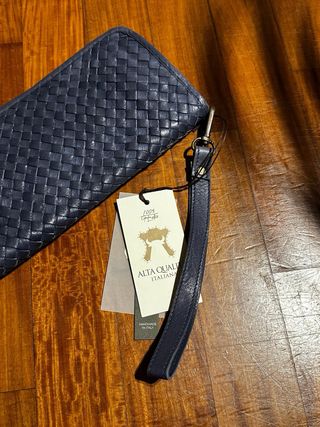 Pochette in pelle intrecciata blu