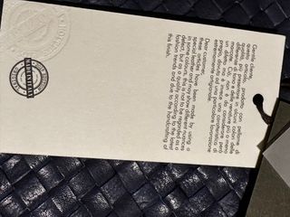 Pochette in pelle intrecciata blu