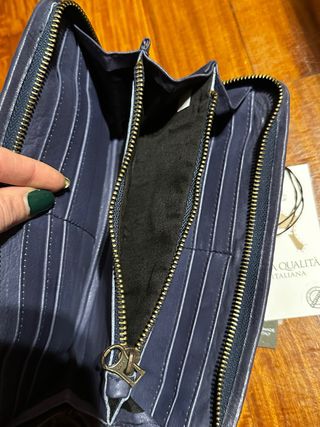 Pochette in pelle intrecciata blu