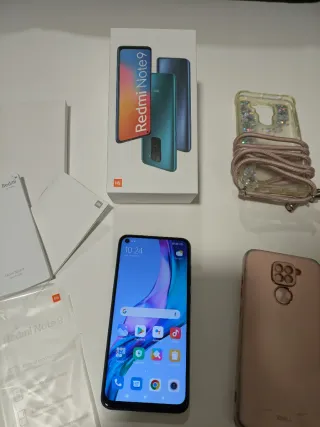 Xiaomi Redmi Note 9 con accesorios