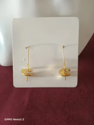 Pendientes dorados largos
