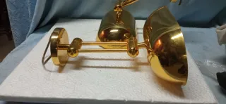 Coppia applique in metallo dorato