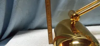 Coppia applique in metallo dorato