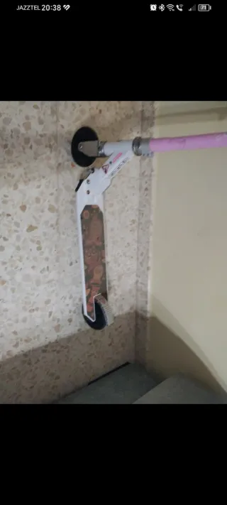 Patinete rosa y blanco