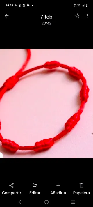 Pulsera 7 nudos roja