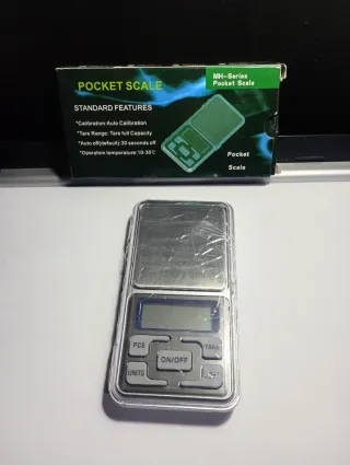 Báscula de precisión para monedas de colección