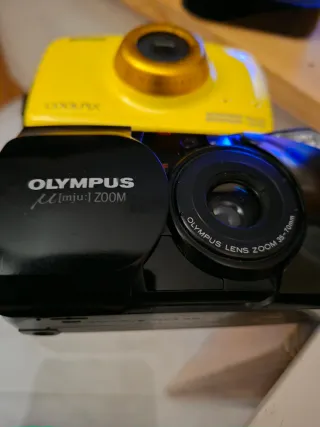 2 Cámaras Olympus y Nikon