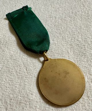 Antigua medalla al mérito académico diosa Minerva.