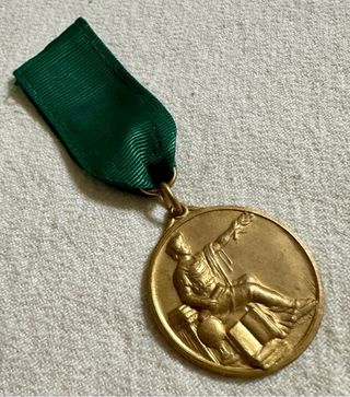 Antigua medalla al mérito académico diosa Minerva.