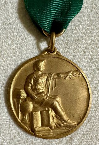 Antigua medalla al mérito académico diosa Minerva.