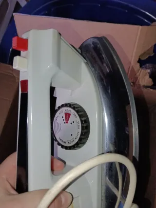 Plancha de ropa antigua