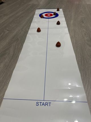 Juego de curling de mesa