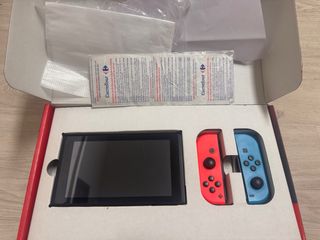 Nintendo Switch Azul y Rojo incluye3juegos y funda