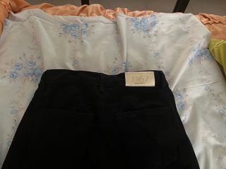 Pantalón Stradivarius campana negro mujer