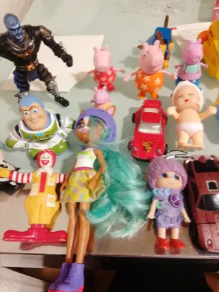 Lote muñecos Disney marvel ect..