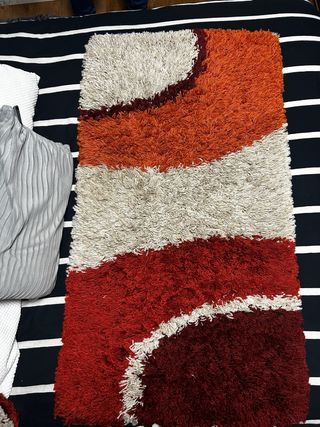 2 alfombras pie de cama