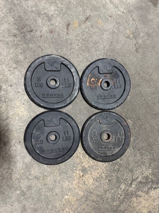4 discos de pesas , 5 kgs cada uno