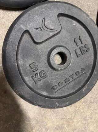 4 discos de pesas , 5 kgs cada uno