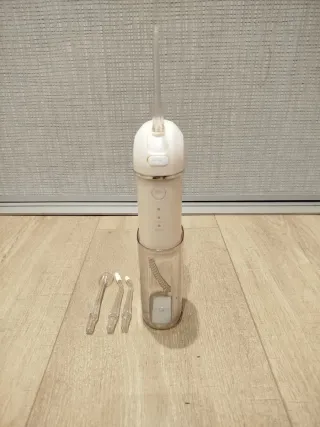 Irrigador dental portátil