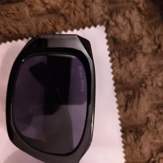 Óculos Miu Miu Pretos