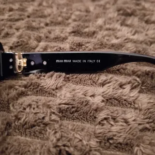 Óculos Miu Miu Pretos