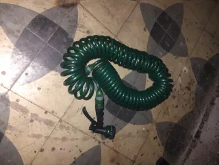 Manguera espiral verde con pistola