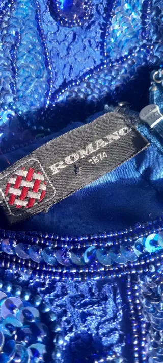 Abito da cerimonia blu con fiori